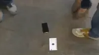 Baru Dibeli, iPhone 6 Jatuh Terbanting ke Trotoar