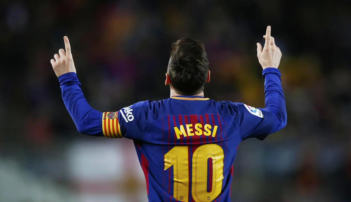 Striker Barcelona, Lionel Messi, melakukan selebrasi usai mencetak gol ke gawang Leganes pada laga La Liga di Stadion Camp Nou, Sabtu (7/4/2018). Barcelona menang 3-1 atas Leganes. (AP/Manu Fernandez)