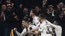 Selebrasi Cristiano Ronaldo pada laga kedua, babak 16 besar Liga Champions yang berlangsung di Stadion Allianz, Turin, Rabu (13/3). Juventus menang 3-0 atas Atl Madrid. (AFP/Filippo Monteforte)