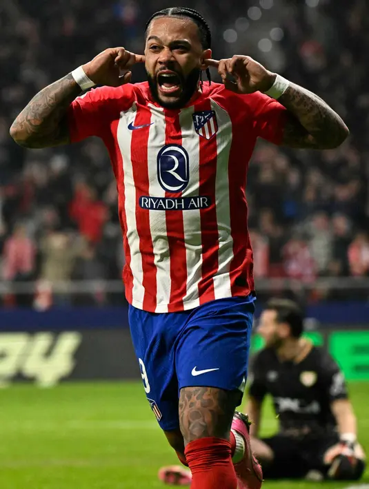 Memphis Depay tampil menjadi penentu kemenangan Atletico Madrid melalui golnya di menit ke-90. (JAVIER SORIANO/AFP)