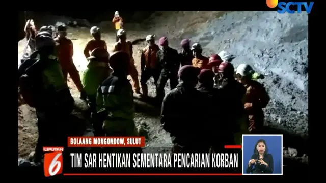 Satu alat berat yang dikerahkan tim sar gabungan terus bekerja membuka jalan untuk mencari dan mengevakuasi korban longsor tambang emas ilegal di Desa Bakan.