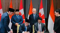 Penandatanganan ICA CEPA yang disaksikan oleh Presiden Prabowo Subianto dan Perdana Menteri Kanada Mark Carney di Ottawa, Rabu (24/09/2025). (Dok Kemenko Perekonomian)