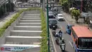 Pengendara melintas di sisi jalur keluar terowongan atau underpass Matraman, Jakarta, Jumat (6/4). Pemprov DKI Jakarta berencana melakukan uji coba lalu lintas di terowongan Matraman pada 10 April mendatang. (Liputan6.com/Helmi Fithriansyah)