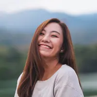 ilustrasi perempuan tersenyum/Blue Titan/Shutterstock