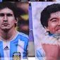 Poster Lionel Messi dan Diego Maradona. (AFP/Martin Bernetti)