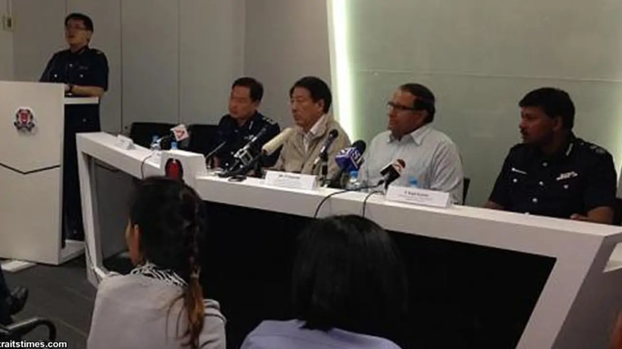 polisi-singapura-1311209a.jpg