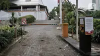 Suasana pintu masuk kendaraan di salah satu pusat perbelanjaan di Jakarta, Kamis (2/4/2020). Merebaknya virus corona COVID-19 menyebabkan pusat perbelanjaan Ibu Kota dan beberapa kota lainnya terpaksa ditutup sementara untuk memutus rantai penyebaran. (merdeka.com/Iqbal S. Nugroho)