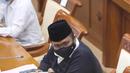 Menteri Agama Yaqut Cholil Qoumas saat mengikuti rapat kerja dengan Komisi VII DPR di Kompleks Parlemen, Senayan, Jakarta, Senin (15/3/2021). Rapat kerja tersebut membahas persiapan penyelenggaraan ibadah haji 1442 H/2021 M dan vaksinasi jemaah haji. (Liputan6.com/Angga Yuniar)