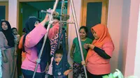 Dinas Kesehatan (Dinkes) Kota Surabaya menggelar kegiatan Timbang Serentak di Posyandu yang tersebar se-Surabaya, Rabu (12/2/2020).  (Foto: Liputan6.com/Dian Kurniawan)
