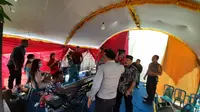 Aparat kepolisian terpaksa membubarkan acara resepsi pernikahan di Desa Karanggeneng, Kecamatan Kunduran, Kabupaten Blora, Jawa Tengah, Rabu (25/3/2020). (Liputan6.com/ Ahmad Adirin)