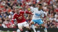 Wayne Rooney masih kesulitan cetak gol untuk MU (Reuters / Jason Cairnduff)
