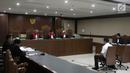 Terdakwa dugaan suap pengadaan satelit monitoring Bakamla, Fayakhun Andriadi saat menjalani sidang lanjutan di Pengadilan Tipikor, Jakarta, Rabu (10/10). Agenda sidang mendengar keterangan saksi ahli kuasa hukum terdakwa. (Liputan6.com/Herman Zakharia)