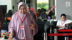 Ekspresi anggota DPRD Kota Malang Heri Pudji Utami usai diperiksa KPK, Jakarta, Jumat (20/4). Heri Pudji diperiksa sebagai saksi untuk tersangka Wakil Ketua DPRD Kota Malang Rahayu Sugiarti. (Merdeka.com/Dwi Narwoko)