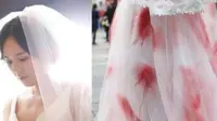 Untuk memprotes pernikahan secara paksa dari orang tuanya, pengantin wanita memakai gaun berdarah di hari pernikahannya