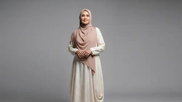 Gamis Warna Cream dengan Potongan Longgar
