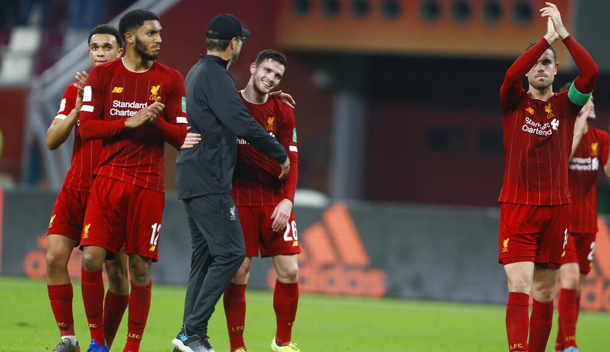Pemain Liverpool merayakan kemenangan atas Monterrey pada laga semifinal Piala Dunia Antarklub 2019 di Khalifa International Stadium, Qatar, Kamis, (19/12). Liverpool menang 2-1 atas Monterrey. (AP/Hassan Ammar)
