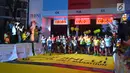 Peserta mengikuti lomba lari BNI UI Half Marathon di kampus UI Depok, Minggu (15/7). Sebanyak 3.600 peserta berlari di kategori 5K, 10K, dan 21K (half marathon) yang mengusung tema The Best Half Marathon inside Campus in Indonesia. (Liputan6.com/HO/Palar)