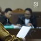 Mantan Kepala BPPN, Syafruddin Arsyad Temenggung saat menjalani sidang pembacaan eksepsi atas dakwaan di Pengadilan Tipikor Jakarta, Senin (21/5). Syafruddin tersangka kasus penerbitan SKL dalam BLBI kepada BDNI. (Liputan6.com/Helmi Fithriansyah)