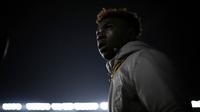 Striker Juventus, Moise Kean, bersiap saat akan menghadapi Pescara pada laga Serie A di Stadion Juventus, Italia, Sabtu (19/11/2016). (AFP/Marco Bertorello)