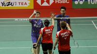 Pasangan Liliyana Natsir dan Tontowi Ahmad, saat melawan Riky Widianto dan Masita Mahmudin pada laga Indonesia Masters 2018 di Istora Senayan, Selasa (23/1/2018). Liliana/Tontowi menang 23-21 dan 21-17 atas Riky/Masita. (Bola.com/M Iqbal Ichsan)