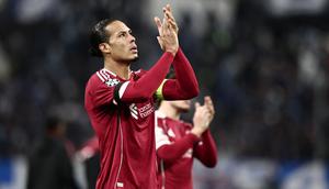 Bek Liverpool, Virgil van Dijk, usai membela The Reds di Liga Champions. (Thibaud MORITZ / AFP)