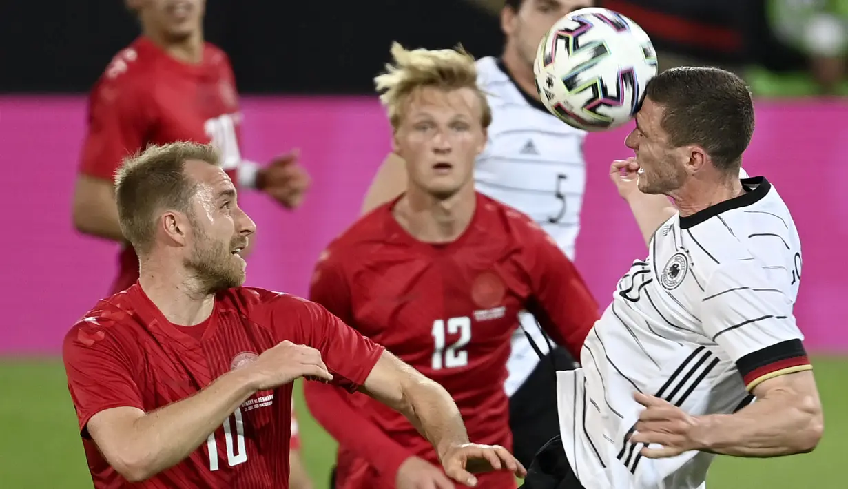 Jeman melakoni pertandingan uji coba pertamanya menjelang Euro 2020 (Euro 2021) di Tivoli Stadium Tirol, Innsbruck, Austria, Kamis (3/6/2021). Sayangnya mereka hanya mendapatkan hasil seri (1-1) melawan Denmark. (Foto: AP/Pool/Frederico Gambarini)