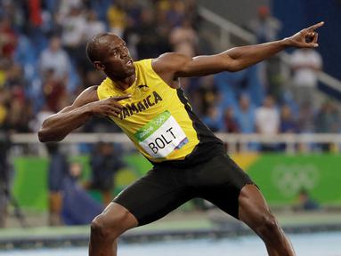 Pelari Jamaika, Usain Bolt, meraih medali emas pada nomor 200 meter Olimpiade Rio de Janiero 2016, Kamis (18/8/2016) atau Jumat pagi WIB. (AP Photo/David J. Phillip)