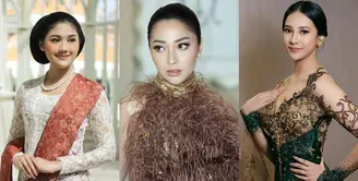 Enzy Storia tampil manis dengan rambut yang disanggul kepang dan dihiasi aksesori bunga. [Instagram/kim_mefta]