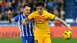 Barcelona unggul 3-1 atas tuan rumah Deportivo Alaves. (AP Photo/Alvaro Barrientos)