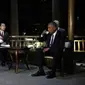 Presiden Obama dan Presiden Xi Jinping minum teh bersama di sebuah paviliun di Hangzhou (AFP)