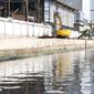 Banjir rob yang menggenangi kawasan Pelabuhan Perikanan Samudera Nizam Zachman, Muara Baru, Jakarta, Sabtu (6/11/2021). Banjir rob tersebut disebabkan karena naiknya permukaan air laut. (Liputan6.com/Herman Zakharia)
