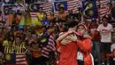Keberhasilan Owi/Butet meraih emas, turut mengangkat klasemen perolehan mendali Indonesia menjadi terbaik kedua untuk kawasan Asia Tenggara. (AP Photo/Mark Humphrey)