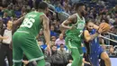 Pebasket Orlando Magic, Evan Fournier, menghindari penjagaan pebasket Boston Celtics, Jaylen Brown, pada laga NBA di Amway Center, Orlando, Minggu (5/11/2017). Magic kalah 88-104 dari Celtics. (AP/Willie J Allen Jr)