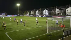Penyerang Tottenham Hotspur, Carlos Vinicius mencetak gol melewati kiper Marine, Bayleigh Passant dalam babak ketiga Piala FA di Rossett Park, Crosby, Inggris, Minggu (10/1/2021). Tottenham Hotspur tanpa ampun menggilas tim semi-profesional, Marine dengan skor 5-0. (Clive Brunskill/Pool via AP)