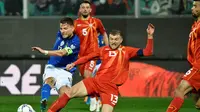 Timnas Italia takluk 0-1 dari Makedonia Utara pada laga semifinal Path C play-off Piala Dunia 2022 di Stadio Renzo Barbera, Jumat (25/3/2022) dini hari WIB. Hasil minor itu membuat Italia gagal ke putaran final Piala Dunia 2022. (AFP/Alberto PIZZOLI)