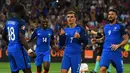 Ekspresi striker Prancis, Antoine Griezmann, setelah mencetak gol kedua ke gawang Jerman pada laga semifinal Piala Eropa 2016 di Stade Velodrome, Marseille, Jumat (8/7/2016) dini hari WIB. (AFP/Franck Fife)