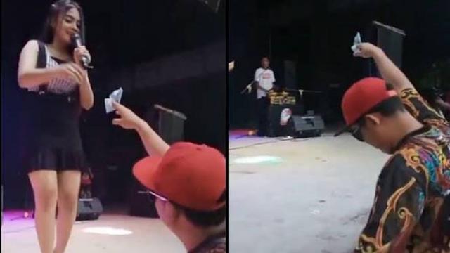 Ketahuan Istri Saat Sawer Penyanyi di Panggung, Aksi Pria Ini Kocak