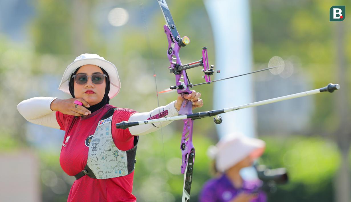 Kepastian emas tersebut datang dari cabang panahan nomor individual recurve putri, melalui penampilan impresif Diananda Choirunisa. (Bola.com/Bagaskara Lazuardi)