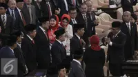 Presiden Joko Widodo saat memasuki ruang sidang tahunan MPR RI Tahun 2015 di Jakarta, Jumat (14/8/2015). Sidang dihadiri 470 anggota MPR RI. Hadir pula menteri Kabinet Kerja, pimpinan lembaga negara, dan perwakilan duta besar. (Liputan6.com/Faizal Fanani)