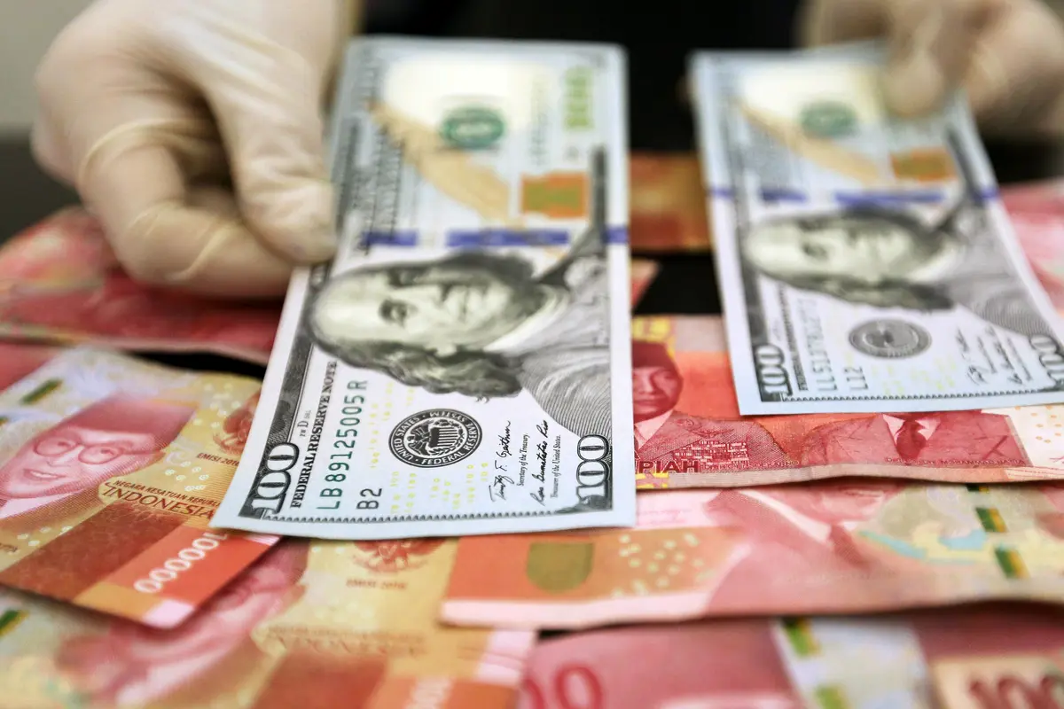 FOTO: Akhir Tahun, Nilai Tukar Rupiah Ditutup Menguat