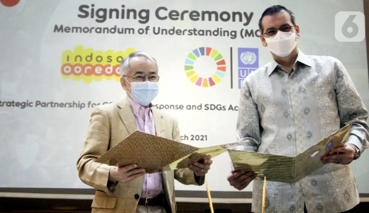 United Nations Development Programme (UNDP) dan Indosat Ooredoo, menandatangani MoU tentang penanggulangan pandemi COVID-19 dan percepatan pencapaian Tujuan Pembangunan Berkelanjutan (SDGs) di Indonesia, menggunakan teknologi digital inovatif di Jakarta. (Liputan6.com/Pool/Indosat)