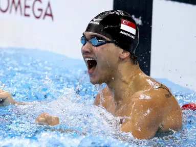  Ekspresi perenang putra Singapura, Joseph Schooling, setelah memenangi 100m gaya kupu-kupu putra Olimpiade Rio 2016 di Olympic Aquatics Stadium, Rio de Janeiro, Brasil, (12/8/2016). (Reuters/Marcos Brindicci)