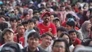 Pendukung Skuad Garuda terlihat sangat antusias dan menaruh harapan besar Timnas Indonesia mampu meraih poin saat bertandang ke Australia. (Liputan6.com/Angga Yuniar)