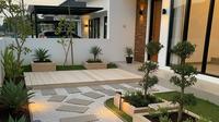 Taman Kering Minimalis yang Aman dari Ular. (Foto: Gemini AI)