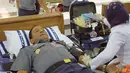 Citizen6, Surabaya: Kegiatan donor darah Prajutrit kobangdikal yang terdiri Perwira,bintara,tamtama dan Pegawai Sipil Kobangdikal di Gedung R Moeljadi Kobangdikal dalam rangka Hardikal ke 65. (Pengirim: Rohman Arif)
