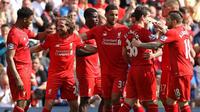 Para pemain Liverpool merayakan gol ke gawang Watford pada laga Premier League di Anfield, Liverpool, Minggu (8/5/2016). (AFP/Lindsey Parnaby)