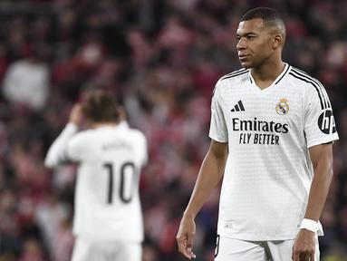Pemain Real Madrid, Kylian Mbappe saat laga lanjutan Liga Spanyol 2024/2025 melawan Athletic Bilbao di San Mames Stadium, Bilbao, Spanyol, Kamis (05/12/2024) dini hari WIB. (AFP/Ander Gillenea)