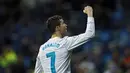 Ekspresi Cristiano Ronaldo saat merayakan golnya ke gawang Getafe pada lanjutan La Liga Santander di Santiago Bernabeu stadium, Madrid, (3/3/2018). Real madrid menang 3-1. (AP/Francisco Seco)