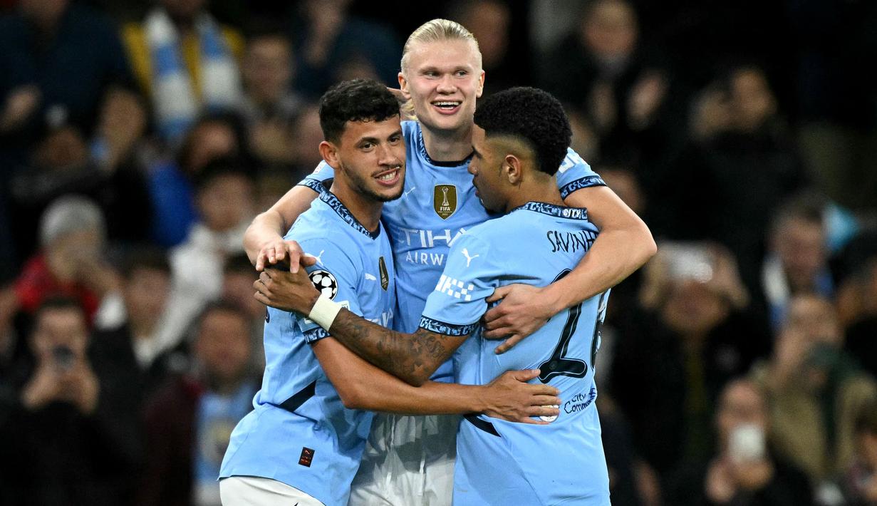 Erling Haaland menyebut bahwa hal tersebut bukan keputusan yang sulit. Pria berkebangsaan Norwegia itu mengatakan jika Manchester City sudah seperti rumahnya, (AFP/Oli Scarff)