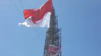 Bendera Merah Putih berukuran 1000 meter persegi di Paser Utara (Liputan6.com/Pool/Gerakan Pramuka)